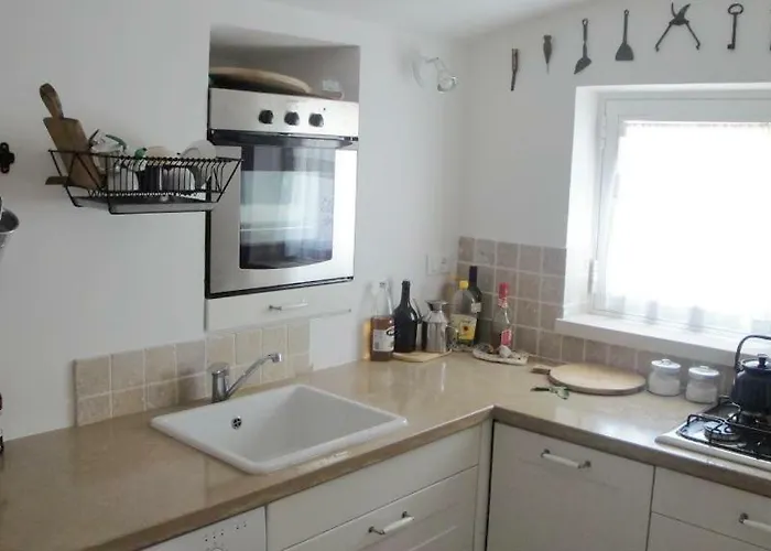 度假居 I Giardini 奥斯图尼